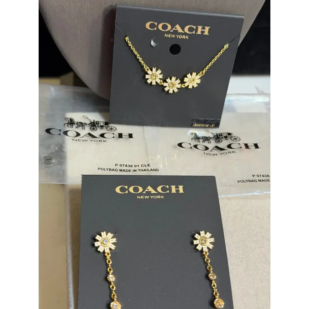 Coach this gold